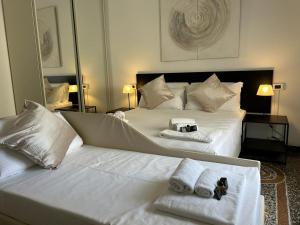 Postel nebo postele na pokoji v ubytování Brignole Rooms