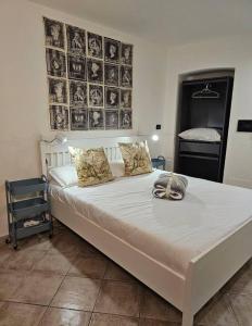 En eller flere senge i et værelse på Good Times Accomodation Cuneo