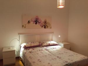 A bed or beds in a room at Villa sul mare Rosa Marina