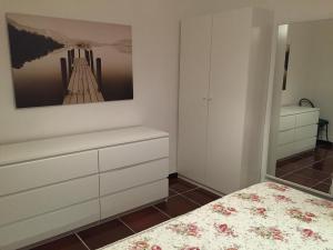 A bed or beds in a room at Villa sul mare Rosa Marina
