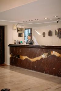 Hóspedes ficando em Hotel Carrera