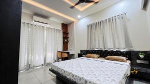 Ένα ή περισσότερα κρεβάτια σε δωμάτιο στο Shyam Sudha Home Stay