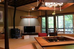 TV a/nebo společenská místnost v ubytování 那須リゾートMOMIJI room stay