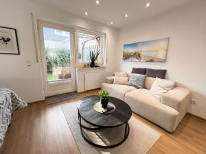 Ein Sitzbereich in der Unterkunft Zentrales Apartment für 2 *Bogenstraße*