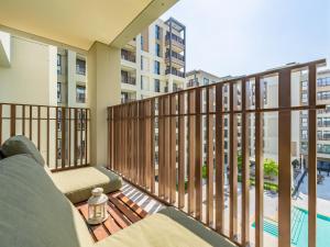 a balcony with a view of a building at Dubai Creek Gem, Stylish Condo With Two Balconies in Dubai
