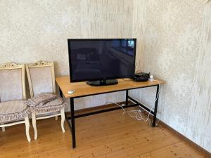 TV a/nebo společenská místnost v ubytování Oguz villa