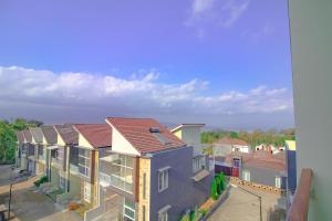 arial view of a row of houses with roofs at Villa Cordoba D11 by Sans Villa in Batu