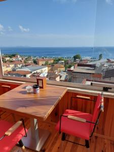 a table and chairs on a balcony with a view at VERSECA HOTEL in Istanbul