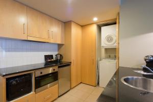 Nhà bếp/bếp nhỏ tại Scenic Suites Queenstown
