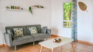 Posezení v ubytování Charmant appartement aux abymes