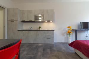Kuchyň nebo kuchyňský kout v ubytování Girasole Apartment - Affitti Brevi Italia