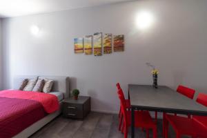 Postel nebo postele na pokoji v ubytování Girasole Apartment - Affitti Brevi Italia