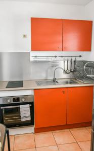 Kuchyň nebo kuchyňský kout v ubytování Charmant appartement aux abymes + 2 fotografie