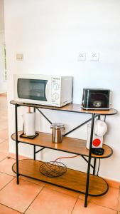 Kuchyň nebo kuchyňský kout v ubytování Charmant appartement aux abymes