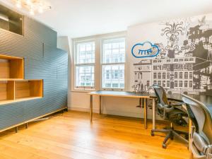 an office with a desk and chairs in a room at Pass The Keys Gorgeous 3-bed with large roof terrace, very central in London