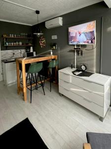 TV a/nebo společenská místnost v ubytování ViDa Loca