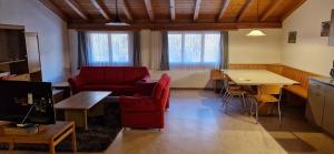 Гостиная зона в Geräumige Wohnungen für Familien und Gruppen 9 Betten