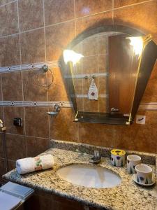 Kúpeľňa v ubytovaní Casa 3 suítes no centro de Cuiabá