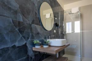 Koupelna v ubytování Murieri Rooms