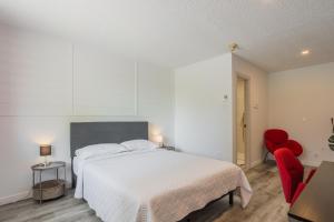 Postel nebo postele na pokoji v ubytování Motel Champlain