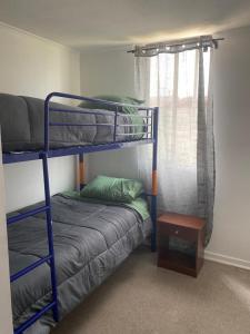 Ένα ή περισσότερα κρεβάτια σε δωμάτιο στο Departamento El Brillador