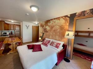 Katil atau katil-katil dalam bilik di Il Cervo Mountain Apartment