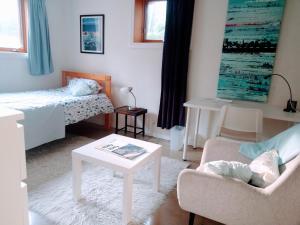 Postel nebo postele na pokoji v ubytování U of A Homestay, Trails & Whyte Ave