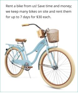 a blue bike with a basket on it at Dockside Utila Ocean front suites in Utila