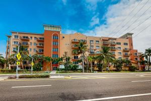 an empty street in front of a large building at Madeira Bay Resort 509 in St Pete Beach
