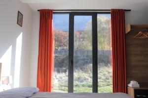 Voodi või voodid majutusasutuse Rooftop Kazbegi toas
