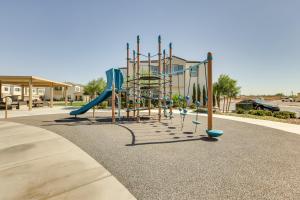 a playground with a slide in a park at Comfy Las Vegas Retreat about 7 Mi to The Strip! in Las Vegas