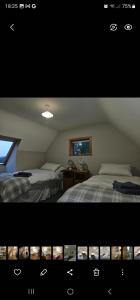 Postelja oz. postelje v sobi nastanitve Longford Holiday Blue Sky Self Catering Cottage