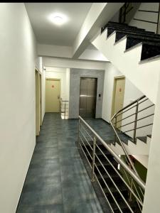 an empty hallway with stairs in a building at IRIS Manyata in Bangalore