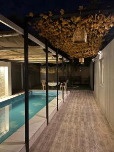 Bazén v ubytování استراحة شرفة الواحةOasis Terrace Inn and Lounge nebo v jeho okolí + 6 fotografií