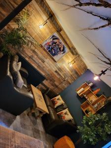 an overhead view of a living room with a couch at The Hideaway in Chapel en le Frith