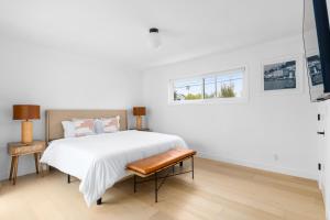 Rúm í herbergi á Beautiful 3 bedroom in Mar Vista