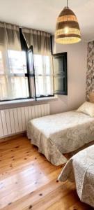 Cama o camas de una habitación en El Acebu