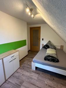 Postel nebo postele na pokoji v ubytování Pension „Haus 11“ Lauta