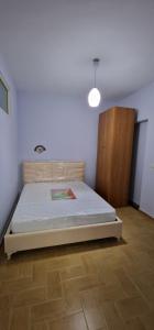 Ένα ή περισσότερα κρεβάτια σε δωμάτιο στο Vlora Home