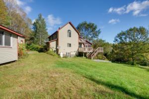 an image of a house with a yard at Charming Putney Home Porch, Grill and Hiking Trails in Putney