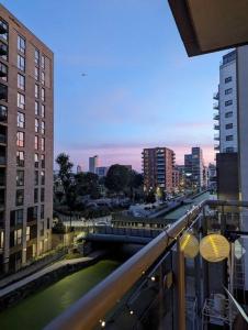 a view of a city from a balcony of a building at Canal Room in London