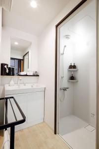 a bathroom with a shower and a sink at Sennichi House - Vacation STAY 20290v in Kanazawa