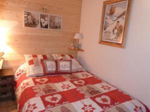 Ein Bett oder Betten in einem Zimmer der Unterkunft Studio 2 personnes - vue Mont blanc