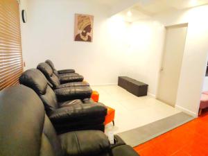 Area soggiorno di Hotel California Suite
