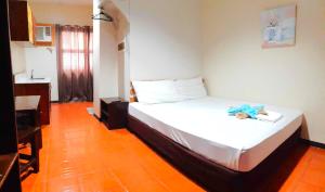Letto o letti in una camera di Hotel California Suite