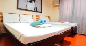 Letto o letti in una camera di Hotel California Suite