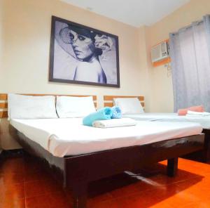 Letto o letti in una camera di Hotel California Suite