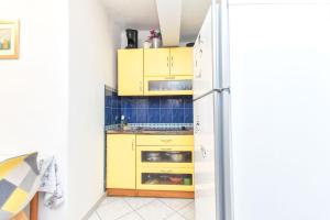 Kuchyň nebo kuchyňský kout v ubytování Apartment Goran