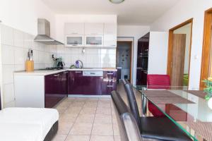Kuchyň nebo kuchyňský kout v ubytování Apartment Goran