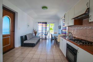 Kuchyň nebo kuchyňský kout v ubytování Apartment Goran